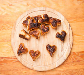 bakery hearts from split pastry on wooden