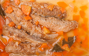 Obraz na płótnie Canvas juicy snack a roast pickled smelt with carrot