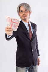 Asian Business man with hongkong Money (HK dollar)