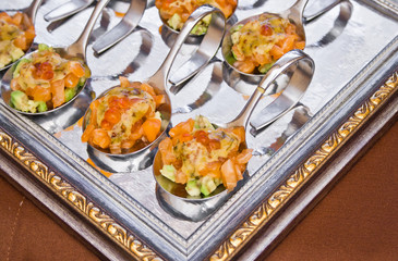 spoon with delicious salad on frame