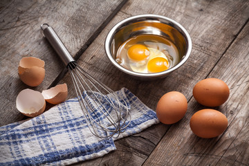 Raw eggs in a bowl