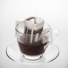 Instant freshly brewed coffee on white background