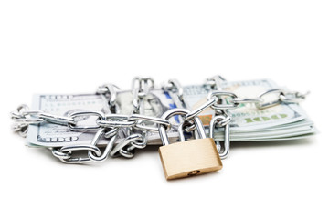 Chain link with padlock on dollar currency money