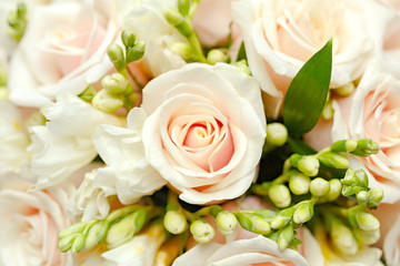 beautiful bridal bouquet of roses at a wedding party