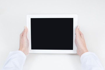 Nurse holding a tablet with free text space