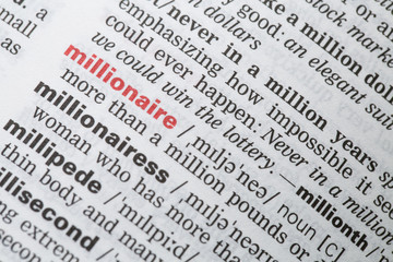 Fototapeta premium Millionaire word in the dictionary