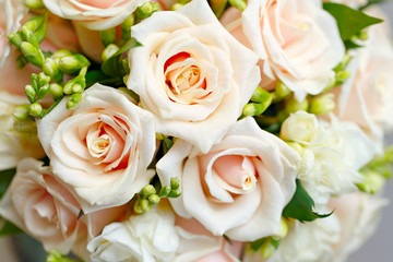 beautiful bridal bouquet of roses at a wedding party