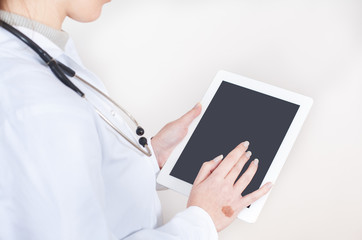 Doctor holding a tablet