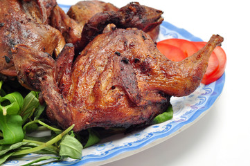 Vietnamese grilled quail on a white background