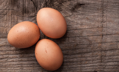 rough background with three eggs