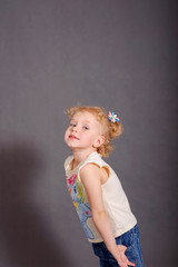 Emotional portrait of a cheerful blonde curly.