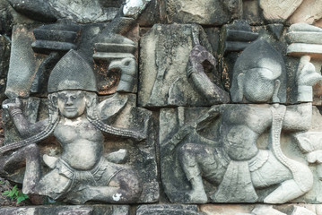 bas-reliefs of the terrace  of the elephants in the archaeological angkor thom place in siam reap cambodia