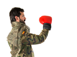 Soldier with boxing gloves