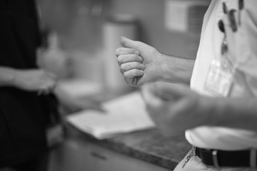 Mid section of a man standing with clenched fists