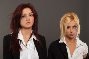 Portrait of two business woman after fight for job interview