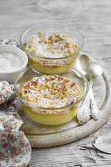 cottage cheese casserole in glass bowls on a light wooden background