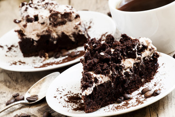 Chocolate and coffee cake with butter cream, selective focus