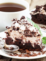 Chocolate and coffee cake with butter cream, selective focus