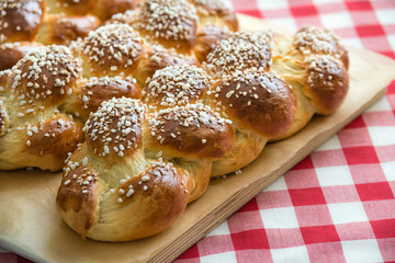 Freshly baked sweet braided bread loafs