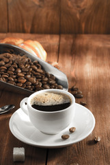 cup of coffee on wood
