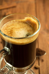 cup of coffee on wood