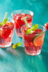 summer strawberry drink with lime and mint