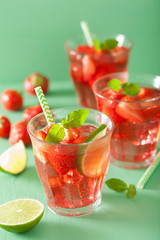 summer strawberry drink with lime and mint