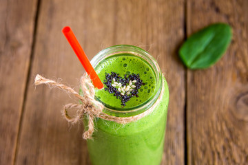 Green smoothie with heart of seeds