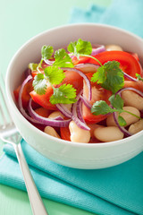 healthy tomato salad with white beans onion coriander