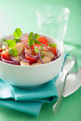 healthy tomato salad with white beans onion coriander