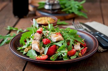 Chicken salad with arugula and strawberries