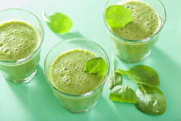 healthy green smoothie with spinach leaves