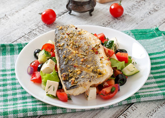 Baked seabass with Greek salad. 
