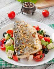Baked seabass with Greek salad. 