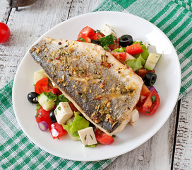 Baked seabass with Greek salad. 