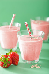 healthy strawberry oat smoothie in glass