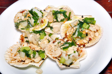Grilled scallops on the dish