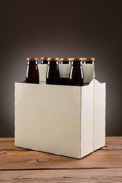 Six Pack Beer on Wood Table