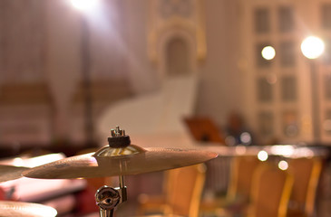 Percussion instrument. A plate of copper. Drums.