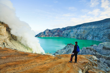 Tourist visit  a crater Volcano Ijen, Java,Indonesia