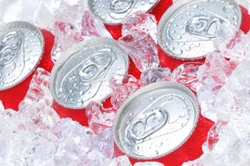 Close Up of Soda Cans in Ice