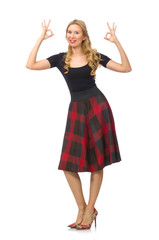 Beautiful young woman in plaid dress isolated on white