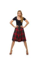 Beautiful young woman in plaid dress isolated on white