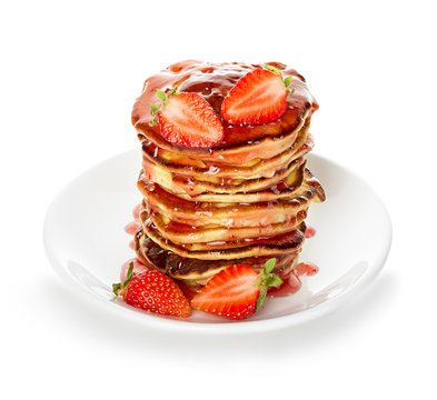Delicious pancakes with strawberry isolated on white background