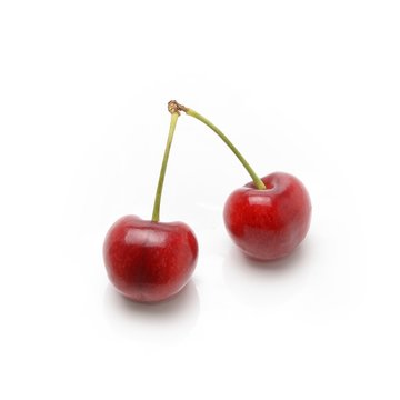 Ripe red cherry berries  isolated on white background