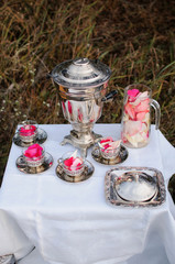 The decor of silver samovar and cups