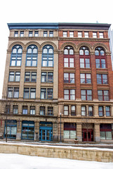 Twin Buildings - Red and White Brick Twin Buildings with Long Arched Windows