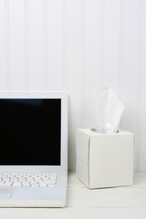 White Desk with White Tissue Box