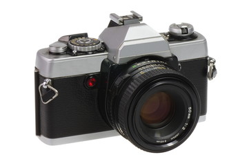 Classic 135 format SLR camera on a white background - isolated