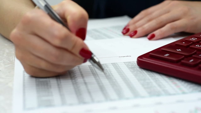 businesswoman audit financial reports, extra close up